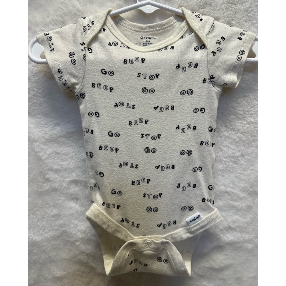 Assorted onesies. - Picture 5 of 8
